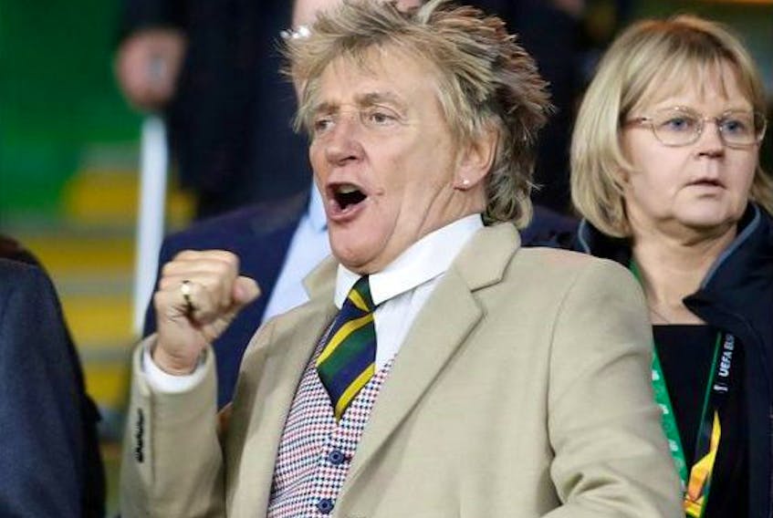  Rod Stewart reacts in the stands during the match.