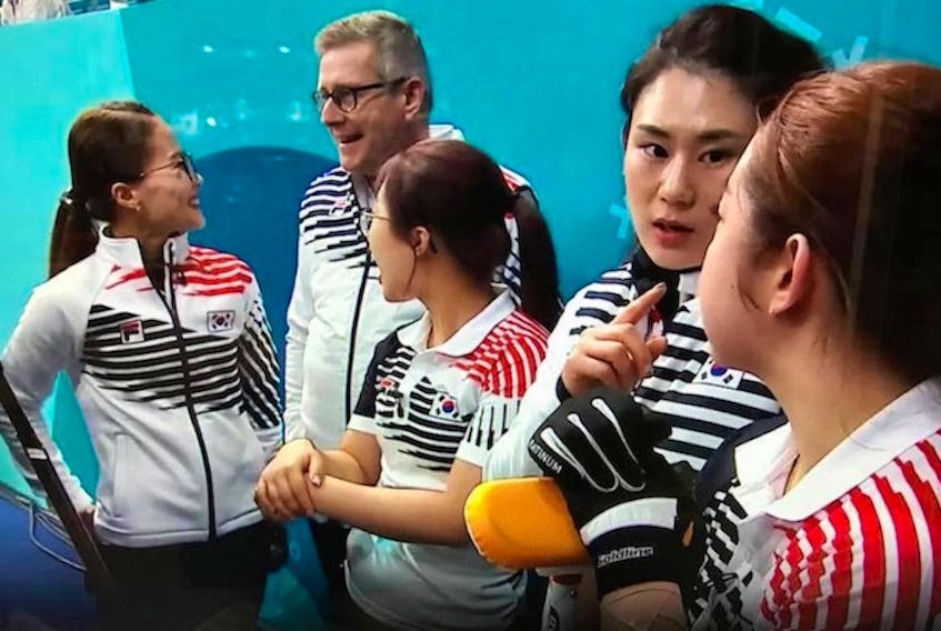 Coach Peter Gallant of Stratford, P.E.I. is shown with his South Korean women's curling team before the gold medal game against Sweden at the Winter Olympics in PyeongChang. Korea lost to finish with a silver medal.

(PEIcurling.com)