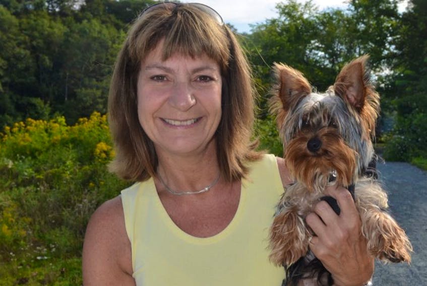 Cindy Edwardson of Kentville, out for a walk with her Yorkshire terrier Wesley.
