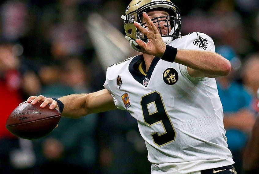 Drew Brees of the New Orleans Saints throws a 62-yard pass to break Peyton Manning's record for All-Time Passing Yards during a game against the Washington Redskins at Mercedes-Benz Superdome on Oct. 8, 2018, in New Orleans, La. 
