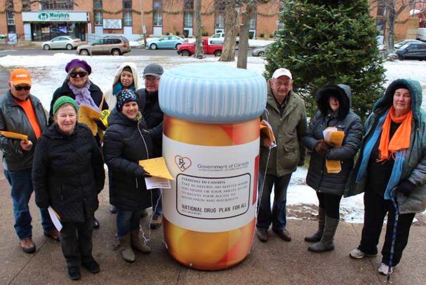 Mary Boyd, front left, chairwoman of the P.E.I. Health Coalition, leads a demonstration supporting a national pharmacare program to the P.E.I. Legislature in this December 2016, Guardian file photo.

(Guardian photo)