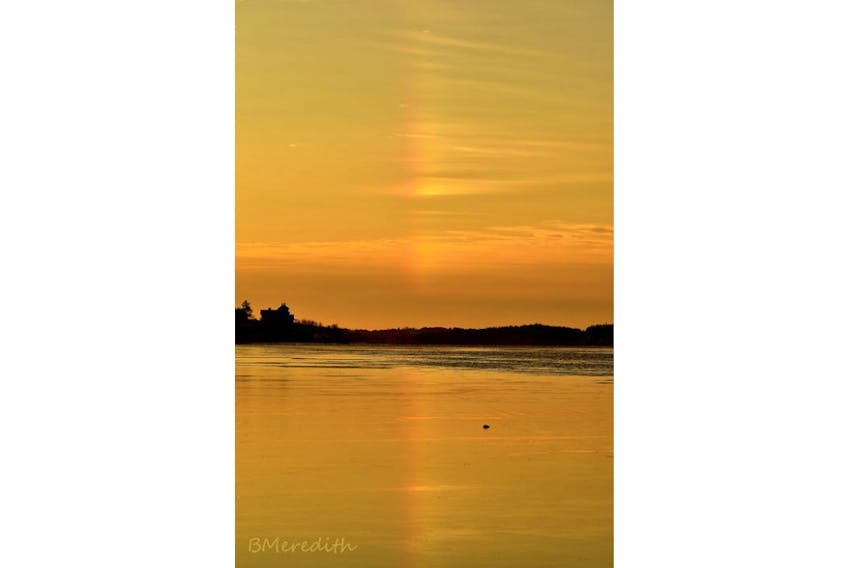 Betty Meredith spotted this vertical shaft of light at Indian Point, Mahone Bay, N.S. The photo was taken shortly after sunrise on a cold, February morning.