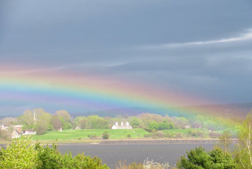 Brian Hay captured this rainbow over Fort Anne in Annapolis Royal, N.S, with his camera - but you can't catch a rainbow with your hand.