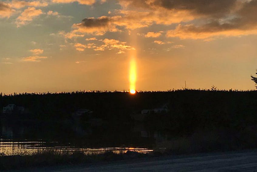 Sunlight or candlelight? Wanda Boutilier spotted this lovely sun pillar as the sun came up in Mushaboom N.S. last Friday.