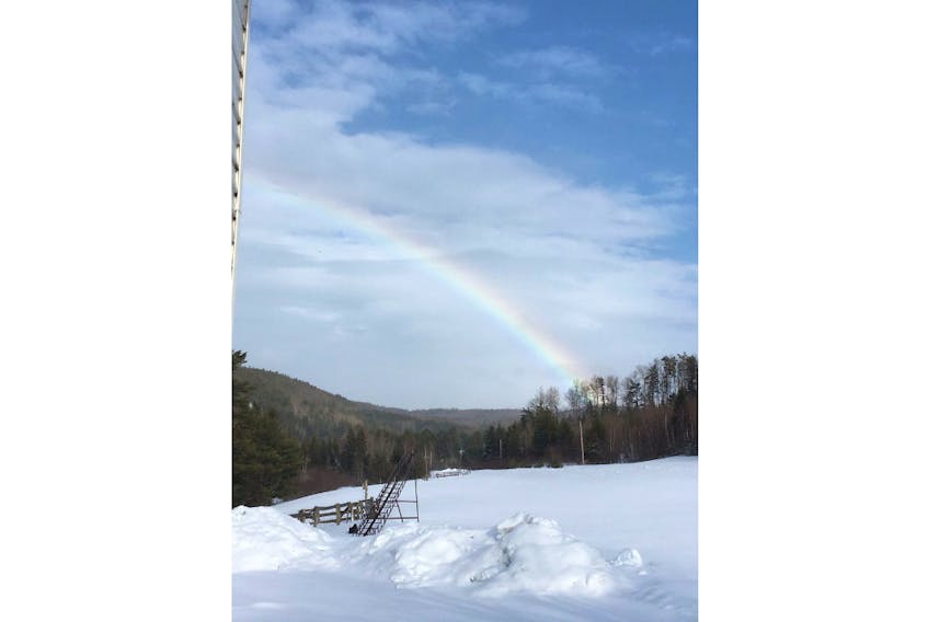Sherry Beaman said the snow had just stopped when she spotted the faint rainbow.  She wondered if it was indeed a snowbow?