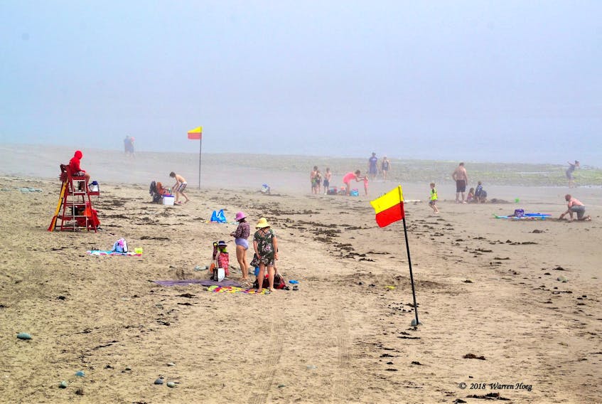 For those who don't like the heat, there is often relief to be found at one of our many coastal beach.  A cool fog was rolling in at Rainbow Haven Beach near Dartmouht, Nova Scotia, when Warren Hoeg snapped this fun photo!