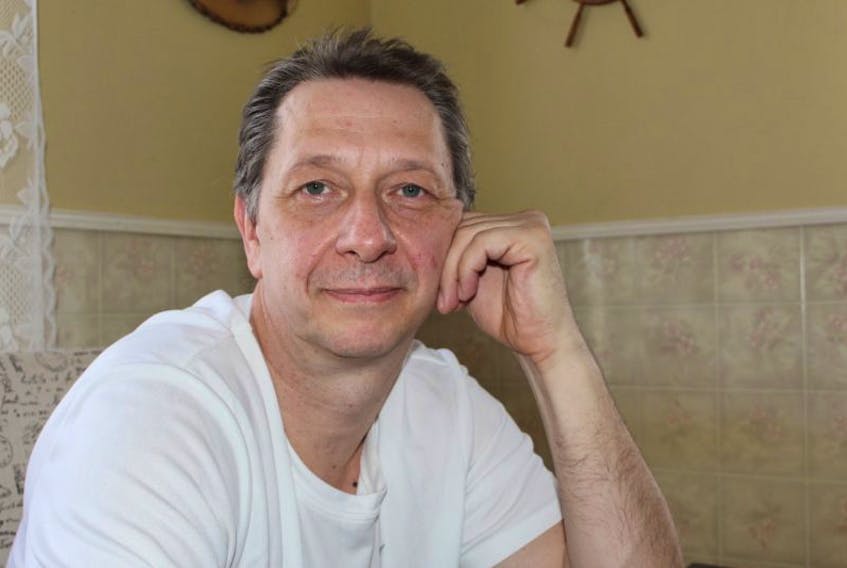 Eddy Merx, a German immigrant who moved to Canada with his family five and a half years ago, is facing uncertainty as he waits for a work permit and a decision on his permanent residency application.