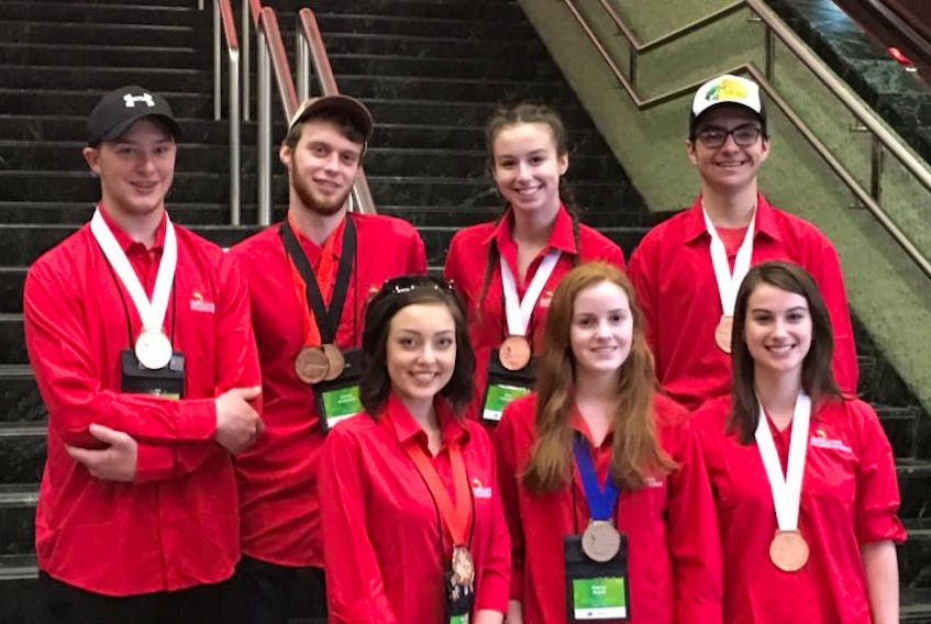 From left back row: Jacob Hood, Cabinetmaking Bronze Medalist; Carter Arsenault, Cabinetmaking Gold Medalist; Erin Chaisson, IT Office Software Application, Bronze Medalist; Jack MacPhail, Workplace Safety Bronze Medalist Front Row: Mary Beth Perry, Hairstyling, Gold Medalist; Fiona Steele, Public Speaking Bronze Medalist; Bria Amyot, Baking, Silver Medalist.
