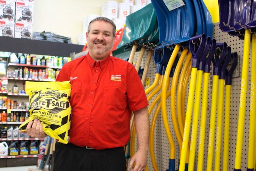 Duane MacDonald, manager of Callbeck’s Home Hardware Building Centre, in front of the store’s winter prep display.