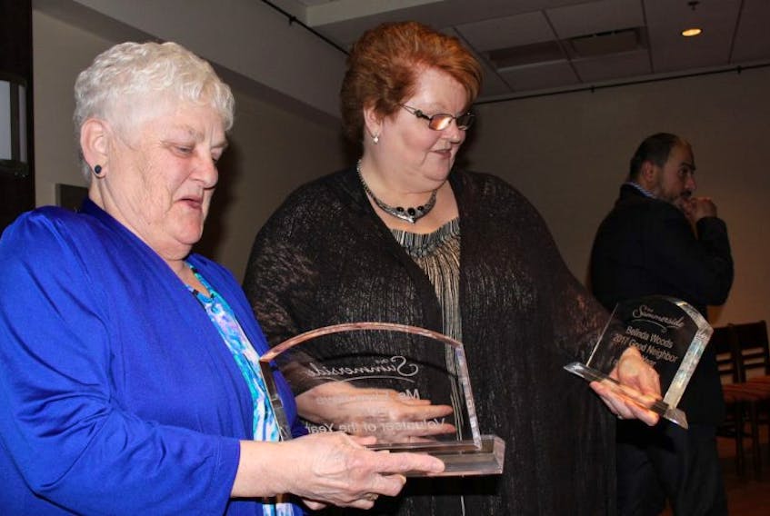 Elma Noye, left, and Belinda Woods chat about their awards at the Annual Awards Gala in Summerside Thursday night.