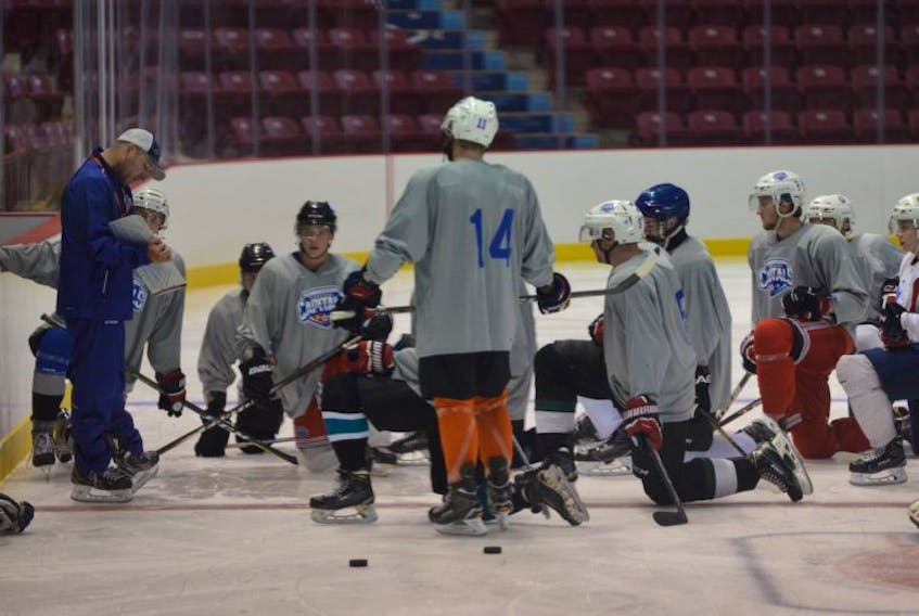 Summerside D. Alex MacDonald Ford Western Capitals assistant coach Thomas Waugh explains a drill to the players during the MHL (Maritime Junior Hockey League) team’s training camp at Eastlink Arena on Thursday afternoon.