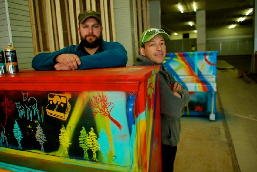 <p>Artist David Gorman and Kevin Vallillee are behind Yarmouth’s piano project. A grand reveal will happen in Alma Square on Saturday, May 14, at 1 p.m.<br />CARLA ALLEN PHOTO</p>
