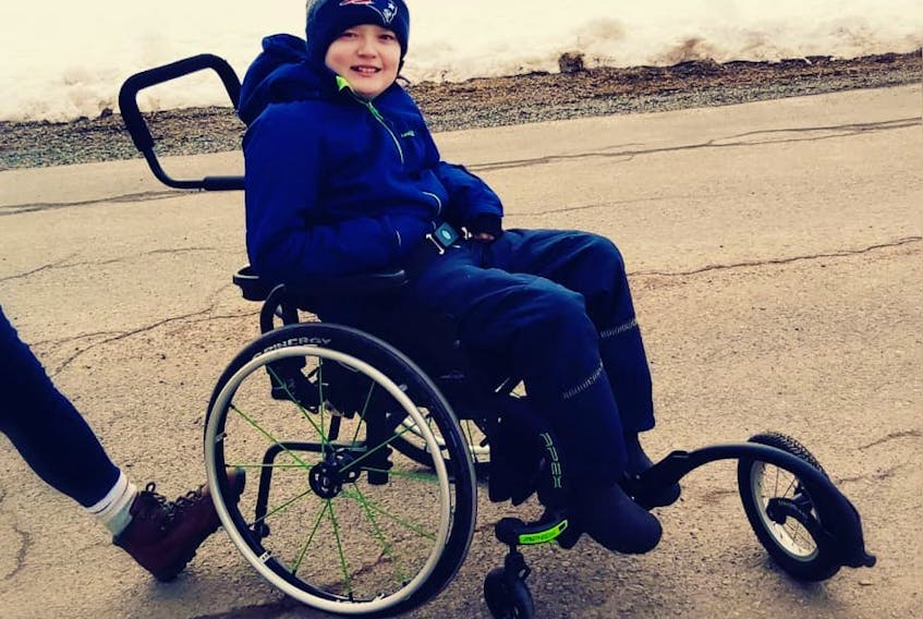 Corbin MacDonald is enjoying his new wheelchair. CONTRIBUTED