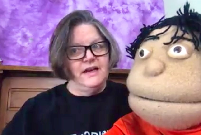 Theresa Fraser and her puppet Simon have been helping kids understand why they need to stay home. CONTRIBUTED/FACEBOOK