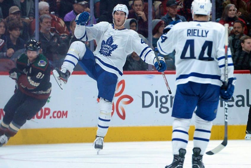 Maple Leafs left wing Pierre Engvall (left) celebrates his goal against the Coyotes during the second period at Gila River Arena in Glendale, Ariz., on Thursday, Nov. 21, 2019.