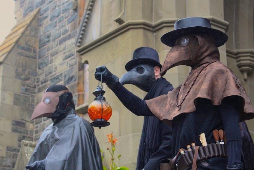 Originally designed in the early 1600s, these plague doctor outfits were an early form of personal protective equipment. It was then exaggerated when it was adopted by people attending the Venetian Carnival, cultural historian and author Ainsley Hawthorn said. — Andrew Waterman/The Telegram