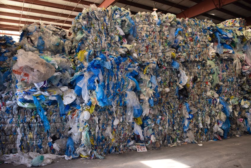 The growing stockpile of waste plastic film products at the Materials Recovery Facility in Kemptown has reached the point where they have run out of indoor storage space.