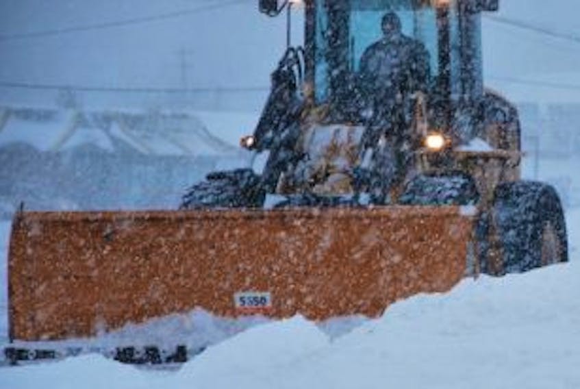 ['Snowplow operators are out in full force this morning in Clarenville keeping parking lots and streets clear.']