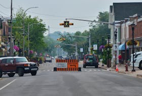 Wolfville’s Main Street was closed on July 29 to allow town staff time to take down signs and barricades to reinstate two-way traffic. KIRK STARRATT