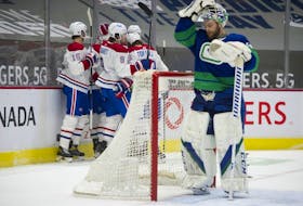 Vancouver Canucks goalie Braden Holtby reacts after a goal by the Montreal Canadiens in the second period of play at Rogers Arena Saturday.
