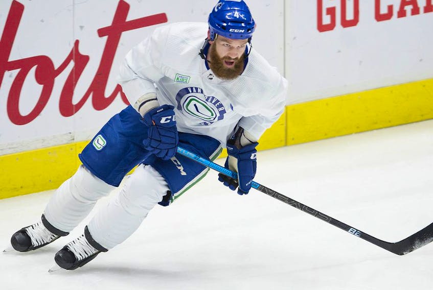 Jordie Benn of the Vancouver Canucks takes a twirl during a December 2019 practice at Rogers Arena.