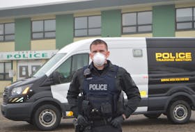 Const. Donnie MacKay, training officer with the Cape Breton Regional Police Service, stands outside the east division detachment in Glace Bay in some protective equipment officers carry now due to the COVID-19 crisis. Officers are equipped with the necessary personal protective equipment to properly keep them and the community safe and are practising all requirements from safe social distancing to frequent hand washing practices, to also help limit potential spread of this virus. SHARON MONTGOMERY-DUPE/CAPE BRETON POST