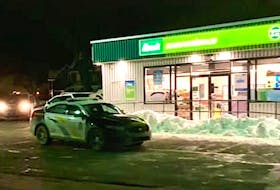 Cape Breton Regional Police converged on Needs Convenience store on George Street in Sydney, after a robbery was reported at about 10 p.m. on Feb. 13. This was the second robbery at a Needs store in the Cape Breton Regional Municipality in four days. Contributed • Jennifer Deveaux-Gillis