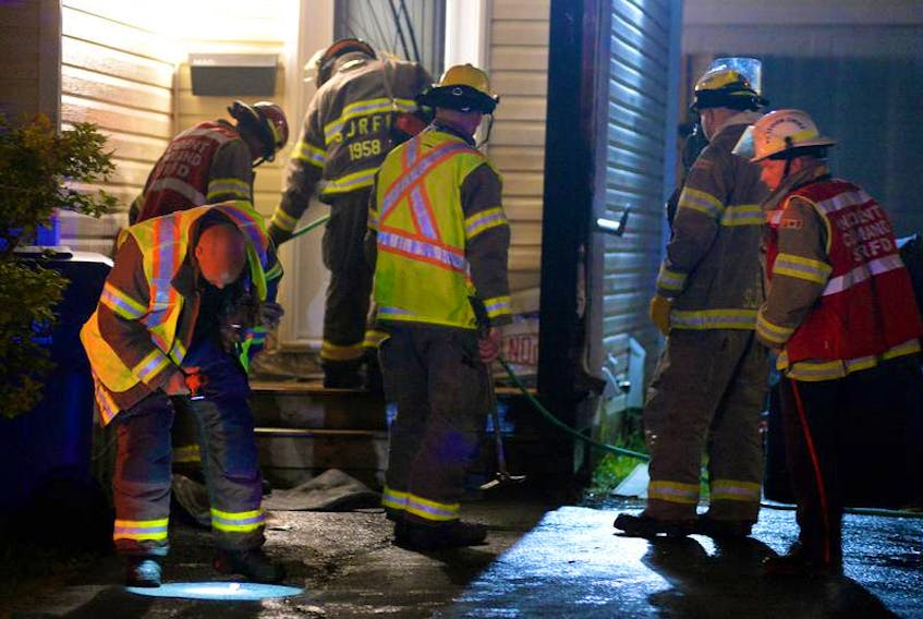 Firefighters and police officers were called to Laumann Place in Mount Pearl early Monday morning — the third time the home has been targeted by arson, police say. KEITH GOSSE/THE TELEGRAM