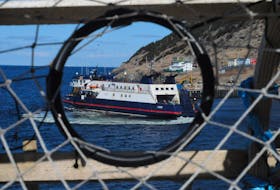 Pot-hole view
The Bell Island ferry M/V Flanders is framed by a lobster pot as it heads towards Bell Island Sunday. - Joe Gibbons/The Telegram
