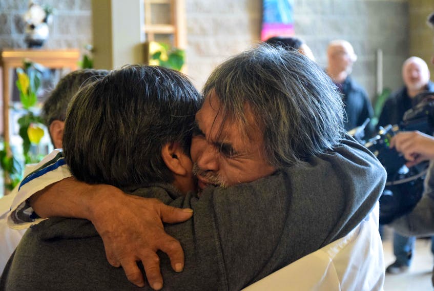 Toby Obed (right) was overcome with emotion at the federal government apology in 2017. He's angry Premier Dwight Ball won't be delivering the provincial apology he promised. - FILE PHOTO