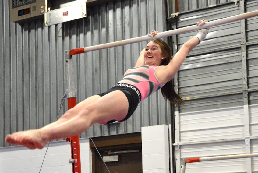 Anabelle Babbage of Cape Breton Gymnastics Academy trains at the Bicentennial Gym in Sydney on Wednesday in preparation for her first competition since the start of the COVID-19 pandemic last March. Thirteen athletes from the academy will be competing at Titans Gymnastics and Trampoline Club in Dartmouth on Saturday. The Sydney-based gymnastics academy is offering an eight-week spring program, beginning in April. Online registration is now open for ages 18 months to 13 years old at www.cbgymnasticsacademy.com. JEREMY FRASER • CAPE BRETON POST