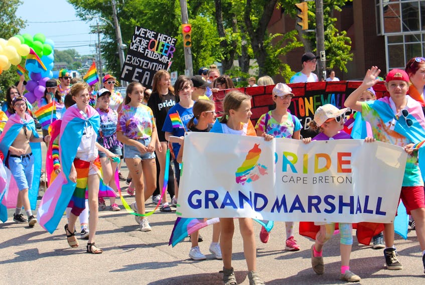 In this file photo, a large group of Cape Breton youth helped lead the way for the 19th annual pride parade with a large mural marking the 50th anniversary of the Stonewall rebellion. ERIN POTTIE • CAPE BRETON POST 