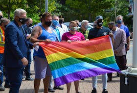 Pride Cape Breton kicked off their annual celebration Friday in Sydney with a flag raising at the Civic Centre. Attending the event were, from left, Cape Breton Regional Municipality Mayor Cecil Clarke, Dave Ward, co-chair for this year’s celebration, Amy MacNeil, event co-chair and Darnell Kirton, who earlier this year organized a support march for Black Lives Matter. CAPE BRETON POST PHOTO