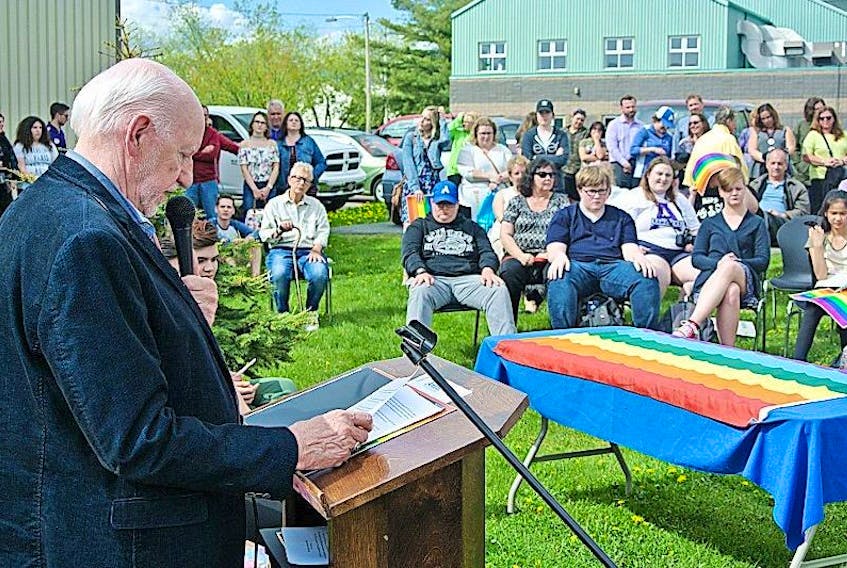 Gerard Veldhoven speaks during the Pride flag-raising ceremony in Amherst on Wednesday.