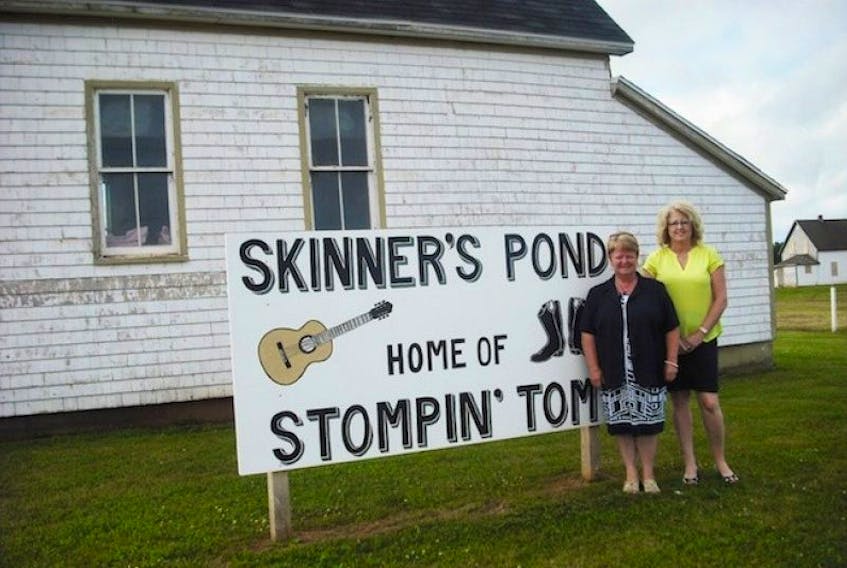 <p>Former Egmont MP Gail Shea, left, and Tignish Initiatives general Manager Anne Arsenault announcing last July 31 that funding had been secured for the Stompin’ Tom Connors commemoration project at Skinners Pond. Work on the project is on hold at least until a review of the overall project is completed. The review was triggered when Canadian Heritage rejected Tignish Initiatives’ request for a $350,000 contribution.&nbsp;</p>