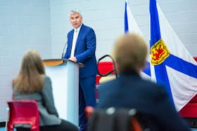 Nova Scotia Premier Stephen McNeil apologizes on behalf of the province for systemic racism in the justice system, including in policing and the courts, at a news conference in Halifax on Tuesday, Sept. 29, 2020.