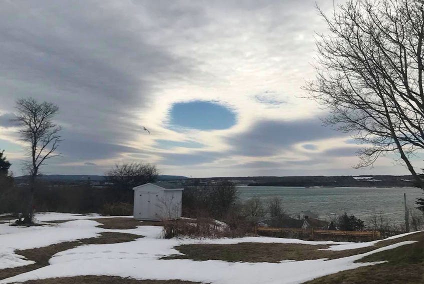 So glad that Heather Lewis was looking up on Saturday!  This hole in the cloud appeared over Sydney, N.S., April 14.
