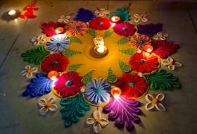 During Diwali, people decorate the floors of their homes by sprinkling colourful powder on the floor in patterns. This is called rangoli. — Submitted