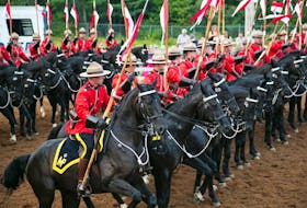 One horse is a little excited that the mounties are about to charge.
