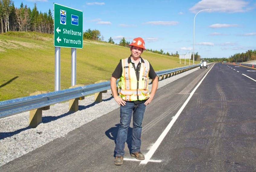 Joe Garber, a surveyor who worked on the Port Joli Bypass stands on the new section of Highway 103. The bypass opened on Sept. 30 to traffic.