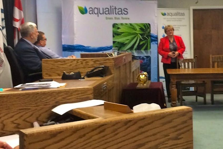 Myrna Gillis, CEO and co-founder of Aqualitas, explains to council how a new medical marijuana grow-operation at Port Mersey Industrial Park will help provide jobs to Queens.