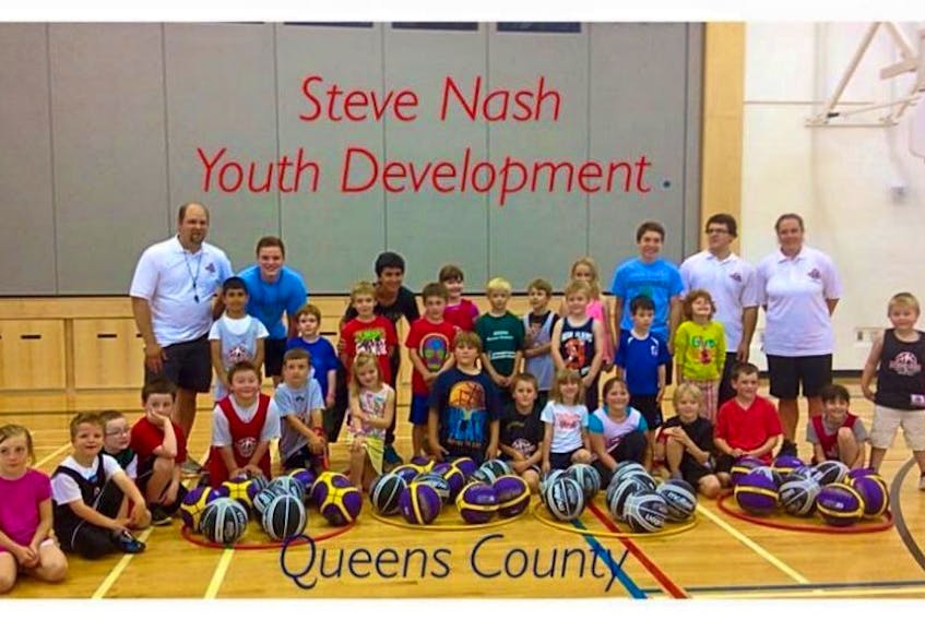 Participants in the Steve Nash Youth Program gathered for a photo last spring after a successful basketball camp. - Submitted