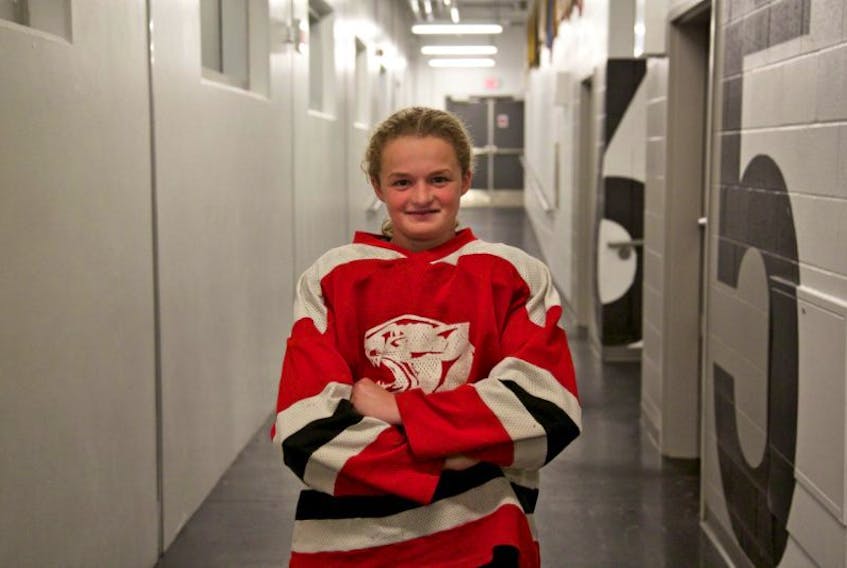 Chloe Burgess, a 13 year-old Queens County resident, is playing on a new competitive all female Bantam AA team. She loves her new team and the atmosphere it brings with it.