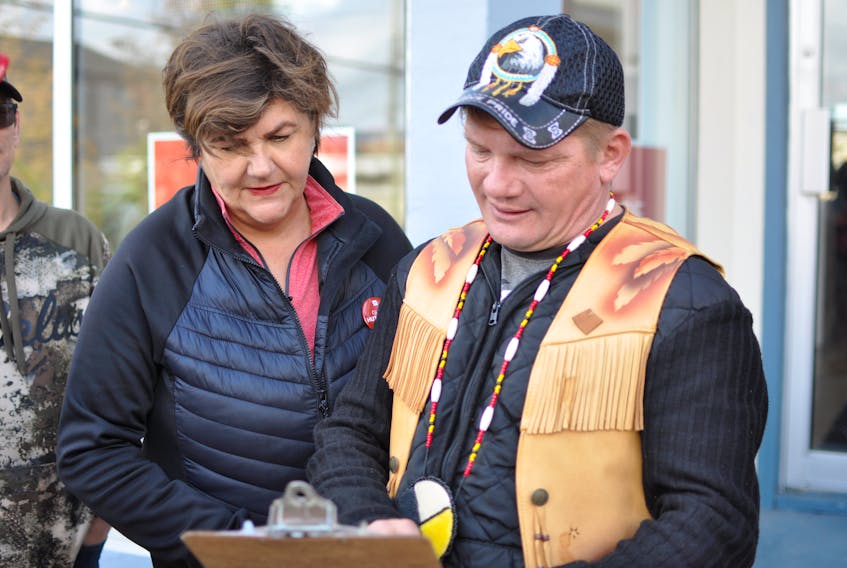 Burgeo Band of Indians Chief Greg Janes with Long Range Mountains MP Gudie Hutchings during a protest in Corner Brook in October 2019.