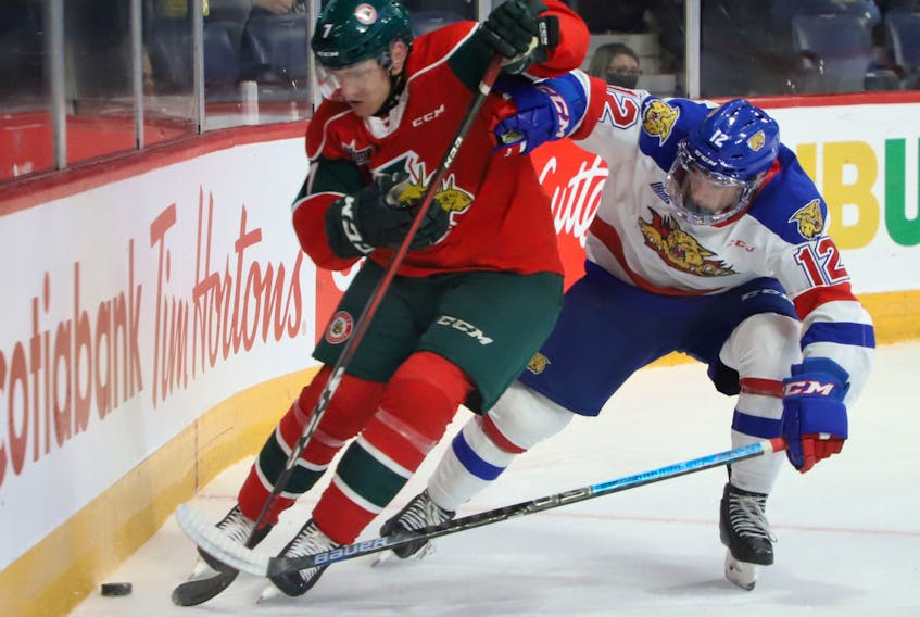 Halifax Mooseheads defenceman Lucas Robinson tries to keep the puck from Moncton Wildcats forward Alexis Daniel during an Oct. 29 QMJHL game at the Scotiabank Centre. (TIM KROCHAK/CHRONICLE HERALD)

