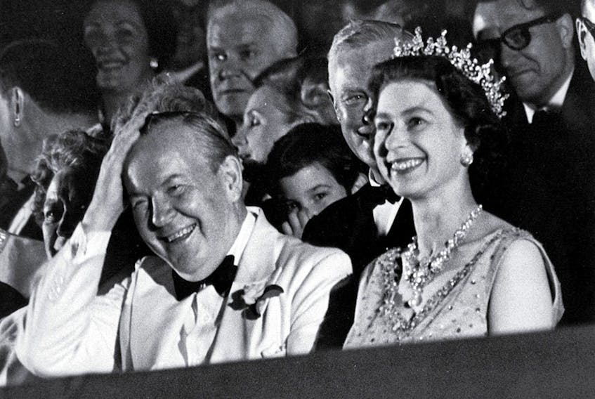 Queen Elizabeth II and Prime Minister Lester B. Pearson enjoy a laugh together, during a visit to Canada in 1967. 