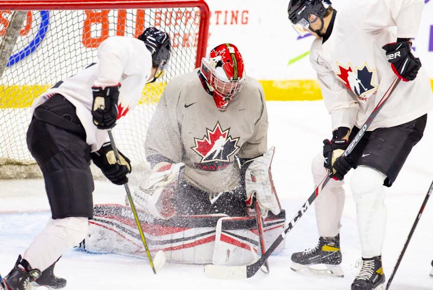 Team Canada players take part in a scrimmage at the Westerner Park Centrium in Red Deer, Alta., on Nov. 21, 2020. 