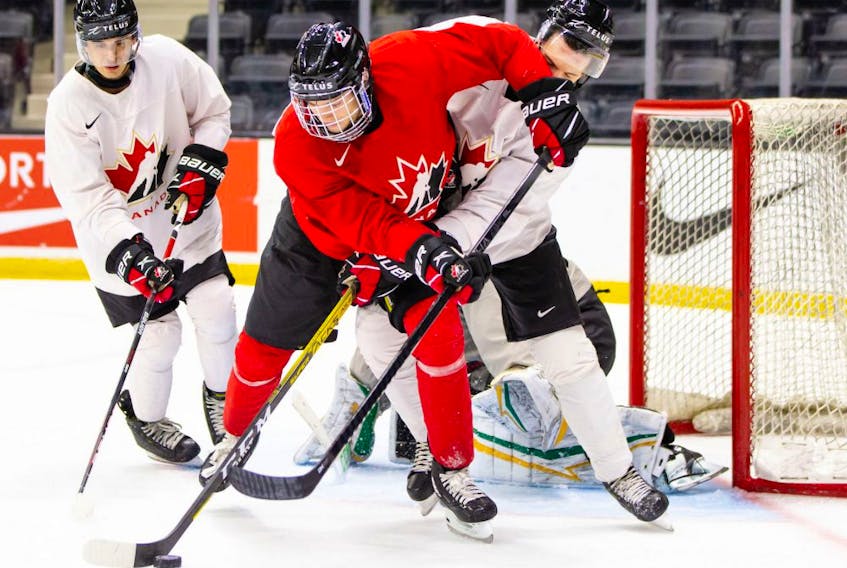 Team Canada players take part in a scrimmage at the Westerner Park Centrium in Red Deer, Alta., on Nov. 22, 2020. 