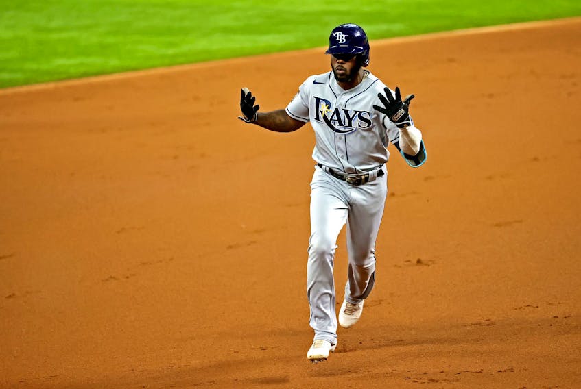 Tampa Bay Rays' Randy Arozarena rounds the bases after hitting a home run during the first inning against the Los Angeles Dodgers during Game 6 of the World Series at Globe Life Field in Arlington, Texas, on Tuesday, Oct. 27, 2020. 