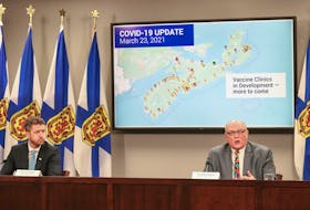 Nova Scotia Premier Iain Rankin and Dr. Robert Strang, chief medical officer of health, hold a news conference Tuesday, March 23, 2021, on the latest COVID-19 immunization plans.